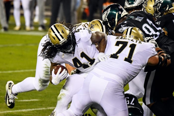 Saints' Alvin Kamara (41) is stuffed by the Philadelphia Eagles defense. © JOE LAMBERTI/USA TODAY NETWORK via Imagn Content Services, LLC